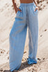 Carmine Juneberry Myosotis high waist wide leg denim pants with drawstring waist and relaxed fit, styled for casual wear.