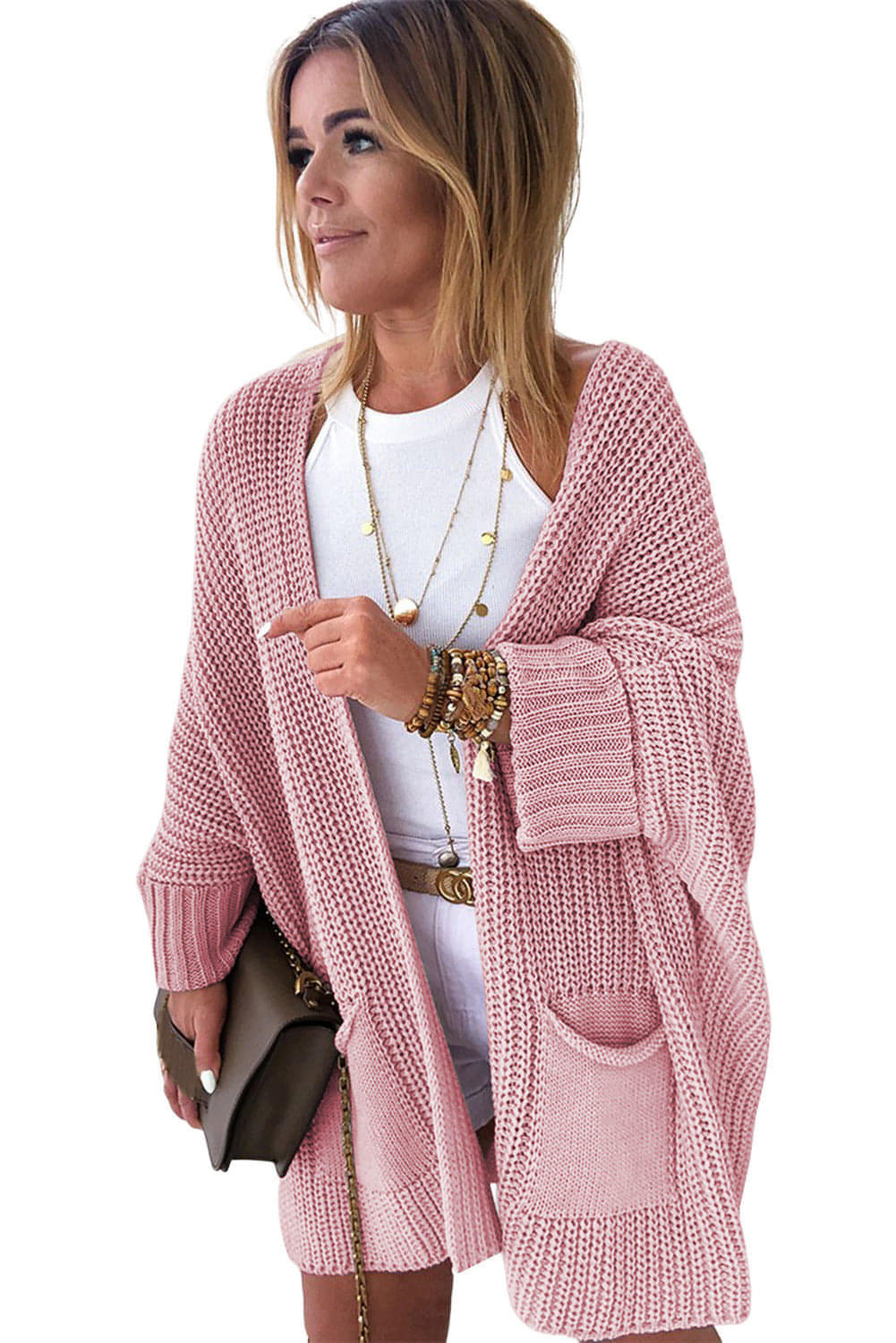 Pink oversized fold-over sleeve open-front cardigan by Carmine Juneberry, showing a cozy, relaxed fit sweater with long sleeves.