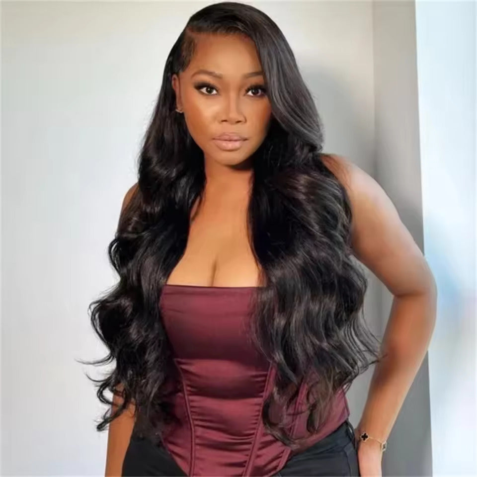 Natural color 4x6 lace closure wig with body wave human hair, styled with parting and lace details, by Pear Daisy.