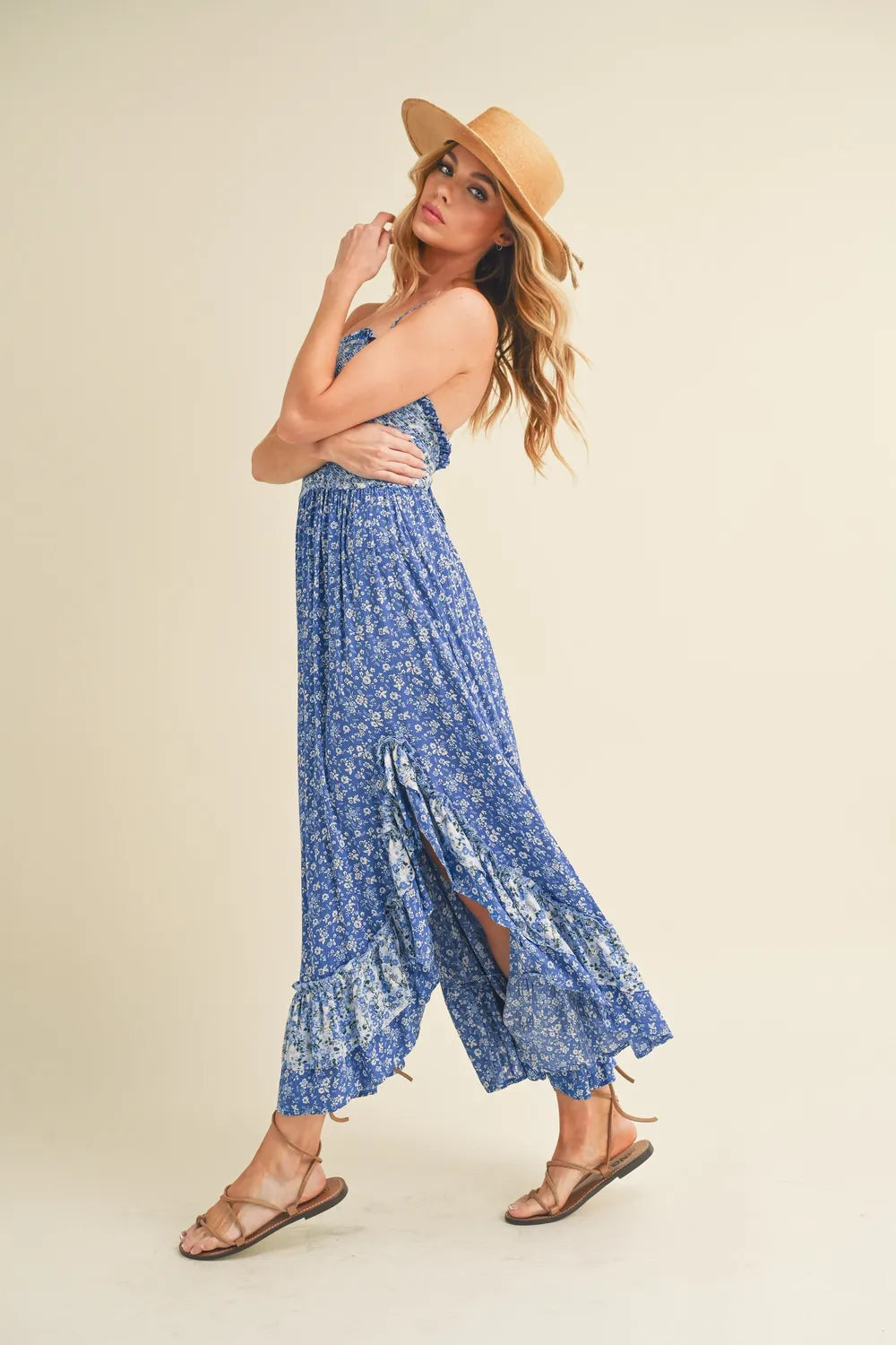 Aemi + Co Ditsy Floral Ruffled Hem Maxi Cami Dress with thin straps and floral pattern, displayed on a hanger.
