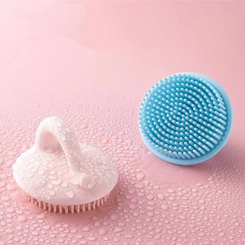 Maroon Asteria baby shower silicone brush for bathing to remove dandruff, featuring soft silicone bristles for gentle scalp cleaning.