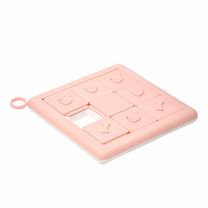 Maroon Asteria Petcare slow food bowl with treasure hunt training toys for dogs to promote mental stimulation and fun feeding.