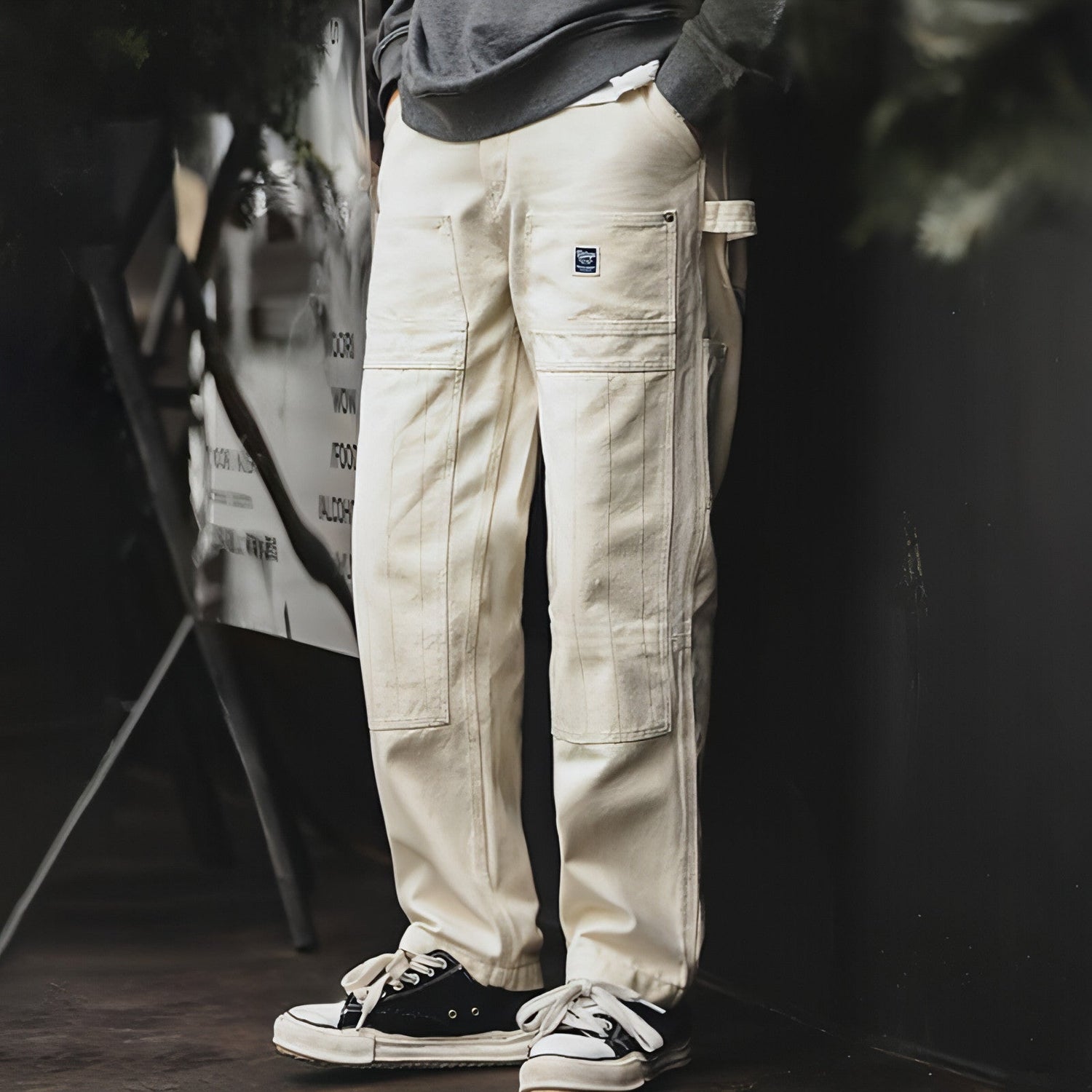 Creamy-white retro distressed loose jeans for men by Carmine Juneberry, showcasing a relaxed fit and vintage-inspired style.