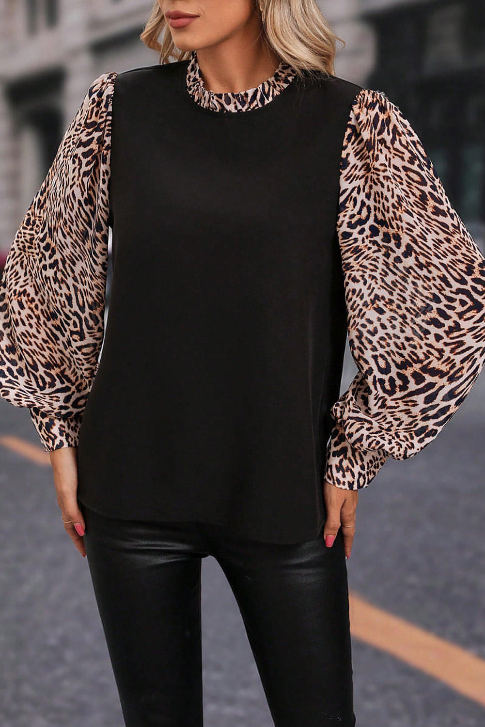 Black contrast leopard print lantern sleeve blouse by Carmine Juneberry, featuring stylish balloon sleeves and a relaxed fit.