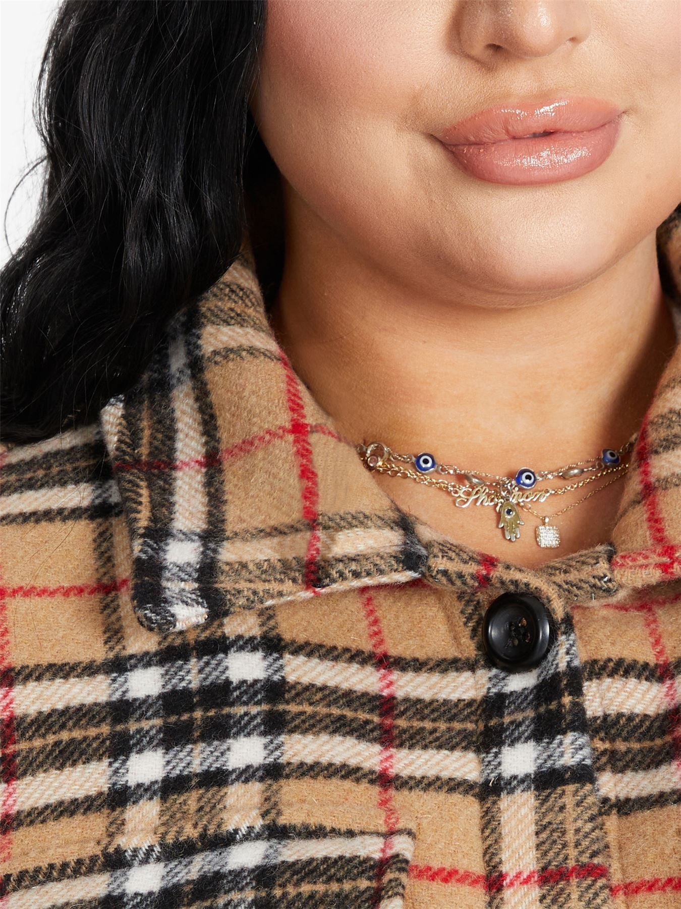 Oversized Nova check wool blend shacket by Rose Eleusis, featuring a plaid pattern, button closure, and relaxed fit.