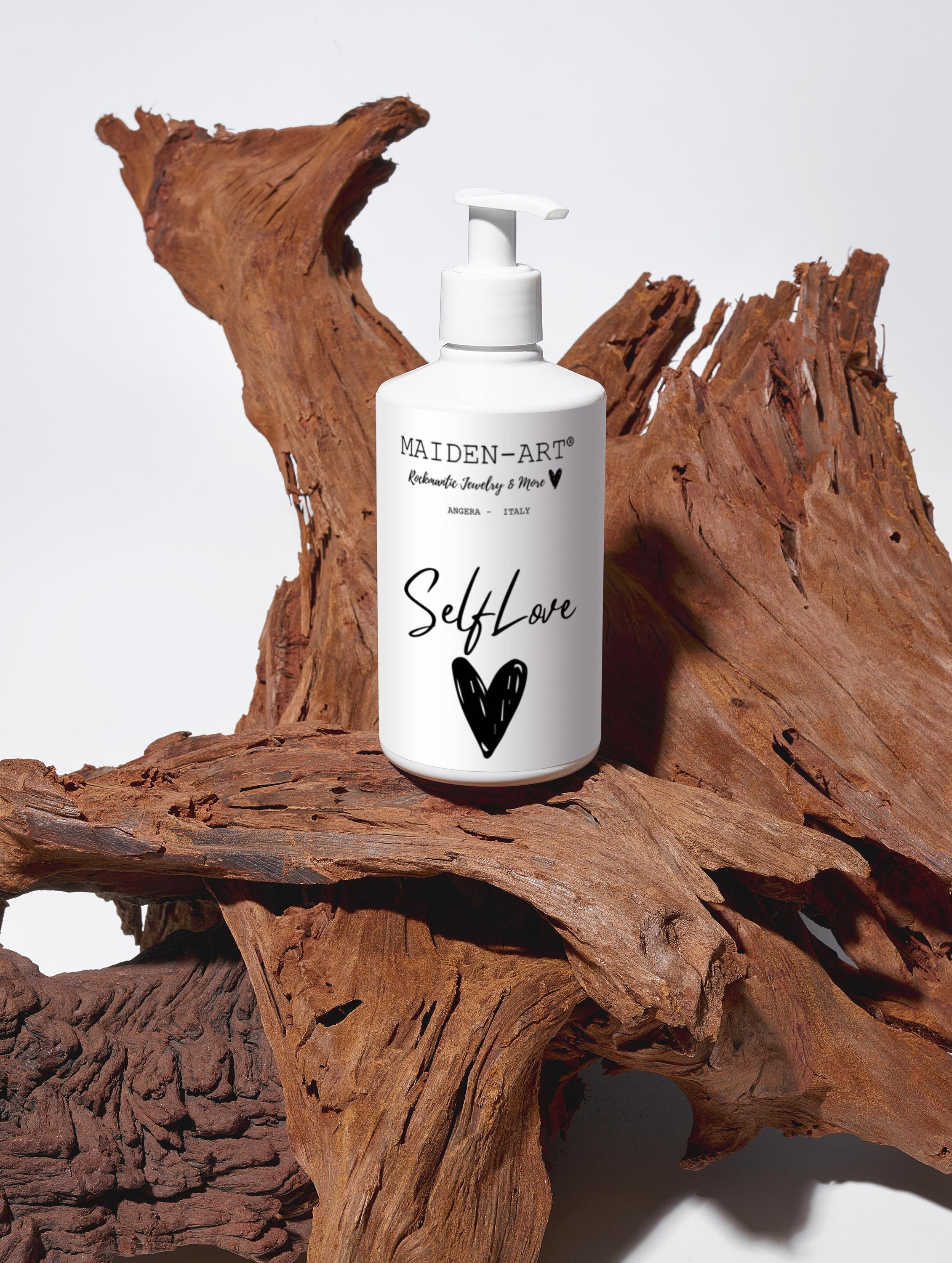 Pink Lucky Self-Love Bliss moisturizing body lotion bottle with floral design, showcasing creamy texture and relaxing bodycare benefits.
