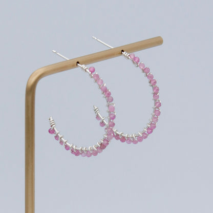 Pink tourmaline beaded sterling silver hoop earrings with a sleek, modern design from Grey Clymene jewelry collection.