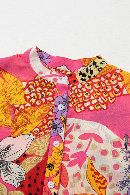 Red abstract floral print buttoned blouse with ruffled bubble sleeves by Carmine Juneberry, stylish top for casual or dressy occasions.