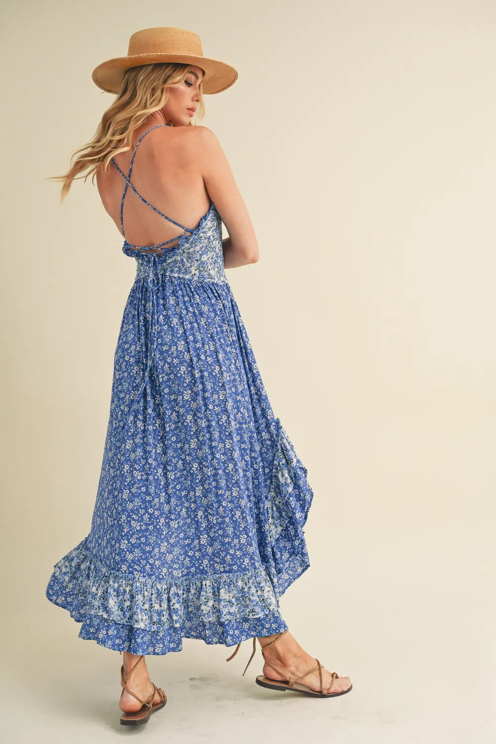 Aemi + Co Ditsy Floral Ruffled Hem Maxi Cami Dress in a light, flowy fabric with a floral pattern and ruffled hem, perfect for warm weather.