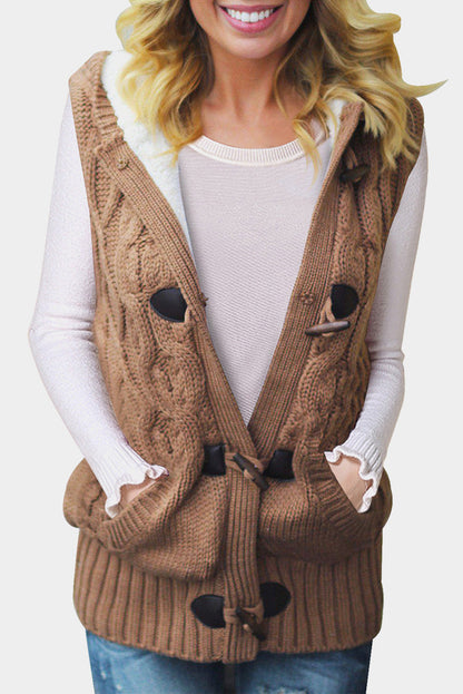 Multicolour cable knit hooded sweater vest from Harlequin Daisy, featuring textured knit and cozy hood, perfect for casual wear.