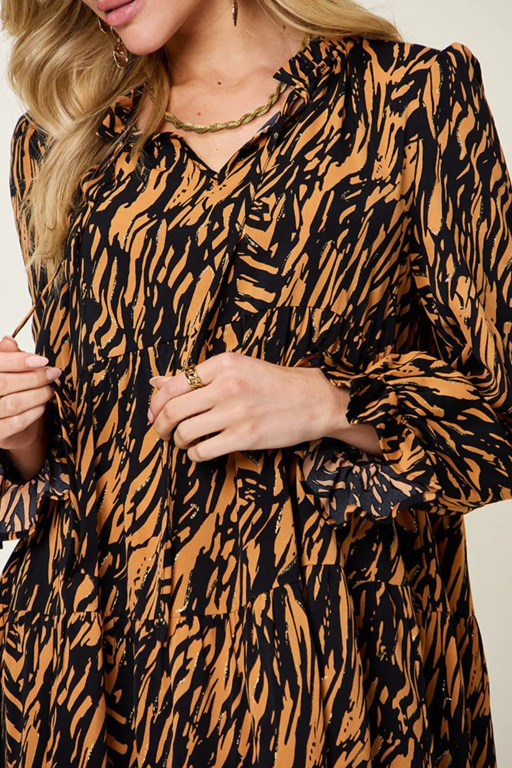 Pear Daisy Double Take printed ruffle hem long sleeve dress, full size, featuring a stylish design with ruffles and long sleeves.