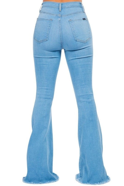 Light wash Jade Icarus bell bottom jeans with a 34-inch inseam, featuring flared legs and classic denim details.