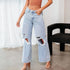 Carmine Juneberry ripped slimming jeans for women with distressed details and a slim fit, shown on a model.