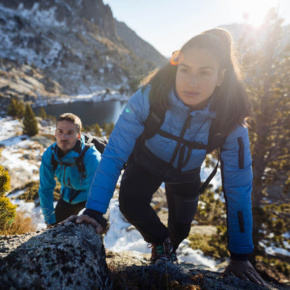 Women’s blue EcoDown jacket by Rose Hemera, lightweight activewear with puffer style and quilted design for outdoor comfort.