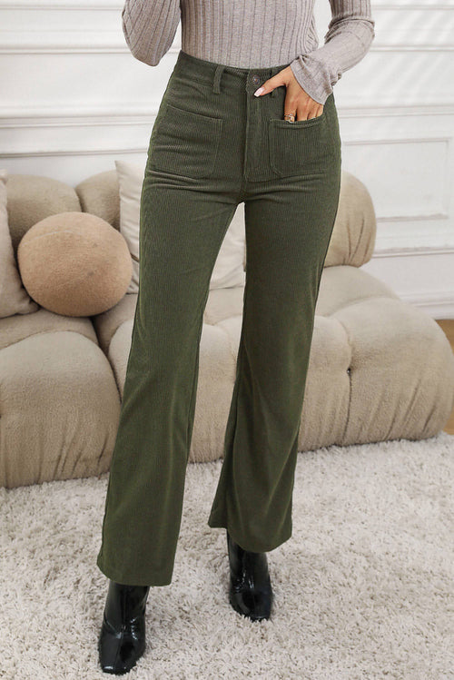 Green high waist corduroy pants with square pockets by Carmine Juneberry, showcasing a stylish and comfortable fit.