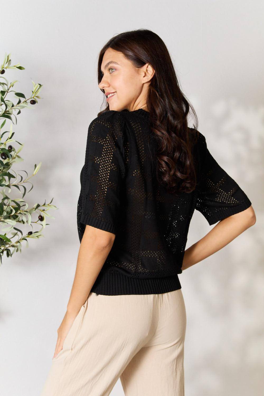 Carmine Juneberry Mandy ribbed trim round neck knit top, showcasing its fitted design and ribbed neckline in a close-up view.