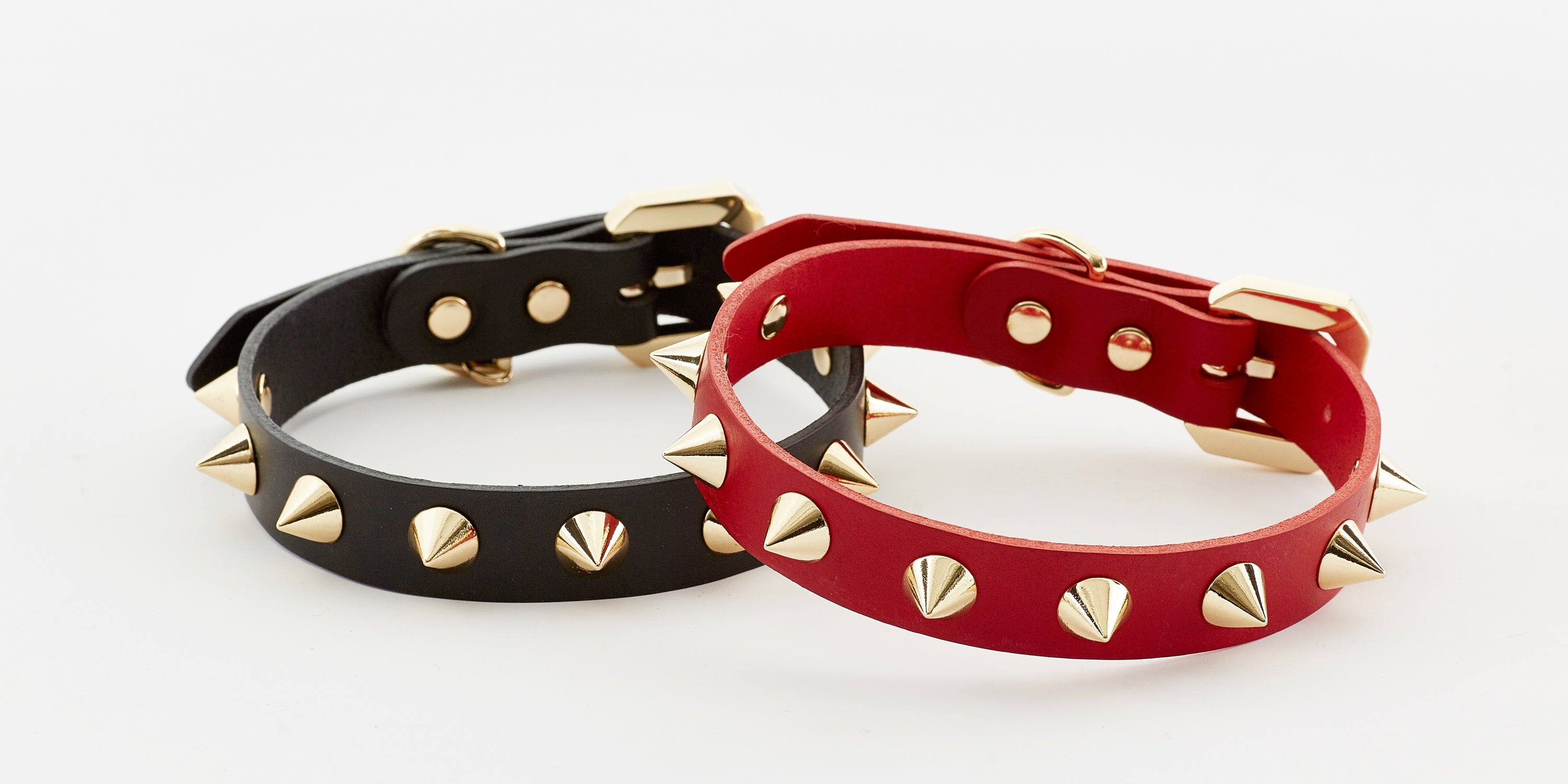 Black pet collar with golden spike detail from Emerald Alfie, designed for stylish and comfortable pet wear.