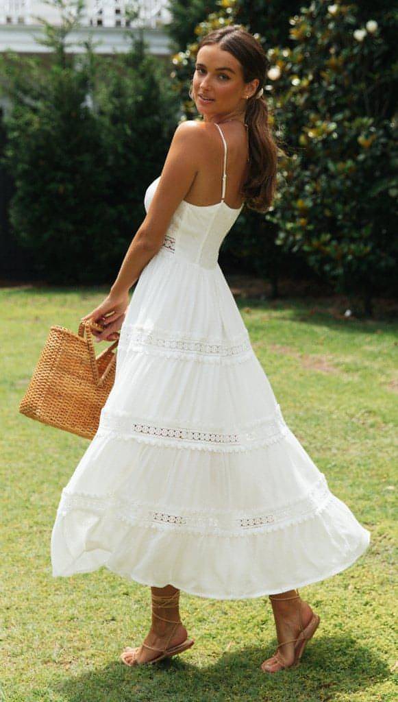 Carmine Juneberry boho sling dress with lace panel and swing skirt, featuring a relaxed, stylish silhouette for casual wear.