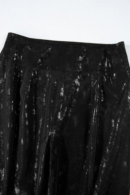 Black faux leather splits high waist leggings from Carmine Juneberry, featuring a sleek fit and stylish design.
