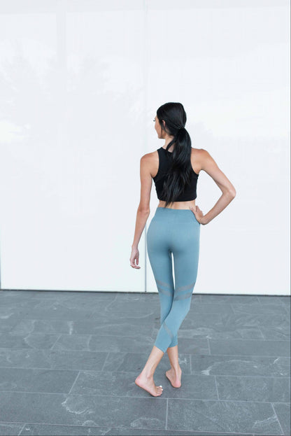 Pink Bearberry Active Vented Mesh Design Capri Fitness Leggings for women, showing breathable mesh panels and fitted athletic style.
