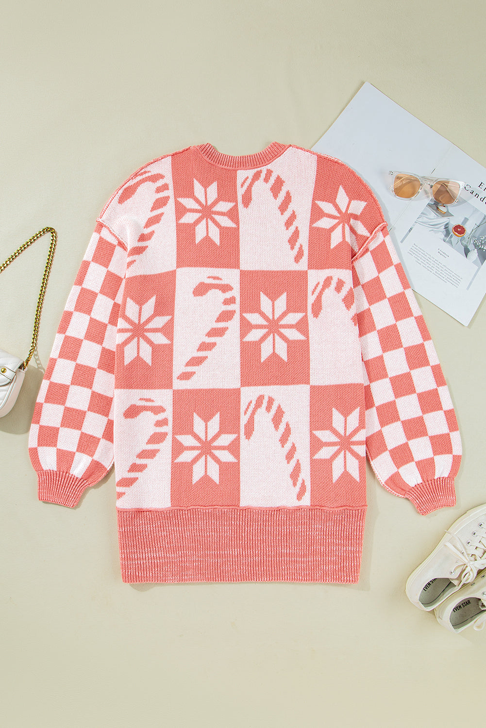 Byzantium Bay Christmas candycane snowflake checker sweater, festive knit sweater with holiday pattern and vibrant red and white colors.