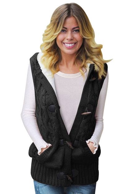 Multicolour cable knit hooded sweater vest by Harlequin Daisy, featuring a cozy, textured design in vibrant shades.