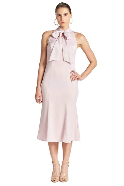 Peach Dionysus Eloise Dress in stretch satin midi mermaid style with a neck tie and rose detail, showcasing elegant evening wear.