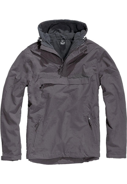 Callisto Essential Windbreaker jacket with lightweight, water-resistant fabric and adjustable hood, shown in a versatile outdoor setting.