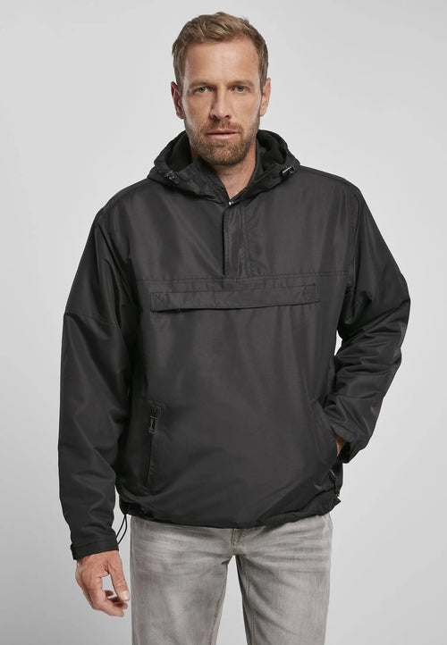 Callisto Essential Windbreaker jacket in black, lightweight with hood, shown on a hanger. Perfect for outdoor weather protection.