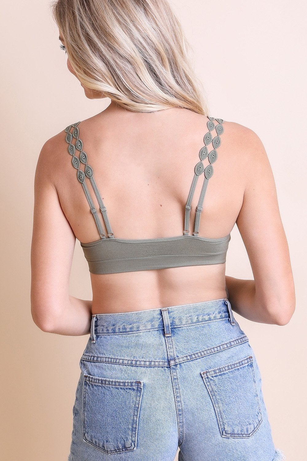 Periwinkle Aether Eye Lace Applique Bralette with delicate lace details and adjustable straps, designed as a stylish accessories piece.