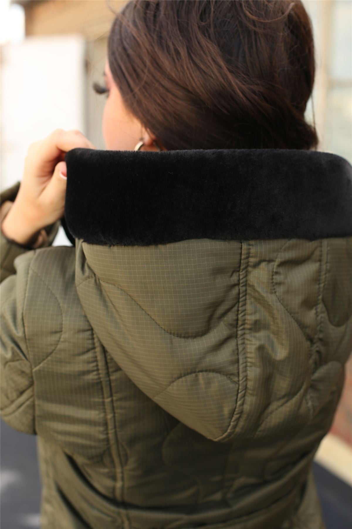 Rose Eleusis quilted single-breasted longline hooded coat, stylish jacket with a quilted design and hood, displayed on a hanger.