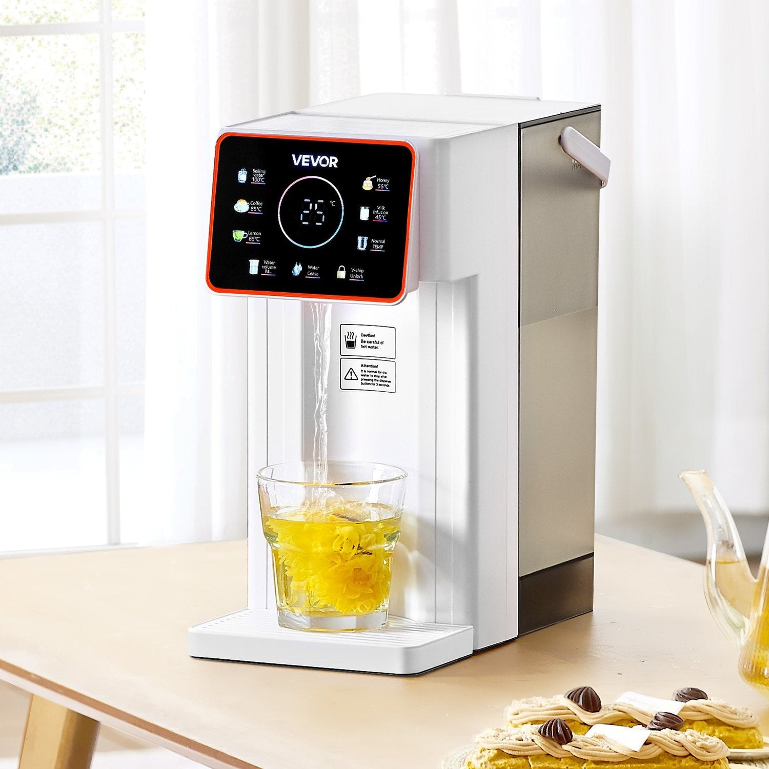 Pear Daisy countertop hot water dispenser with digital display, showing 6 temperature settings and 7 volume options on a kitchen countertop.