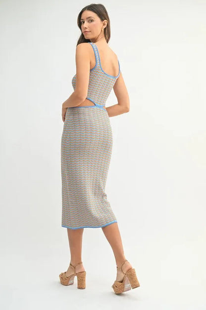 Colorful chevron knit bodycon midi dress by Pear Daisy, featuring multi-color pattern, fitted silhouette, and knee-length design.