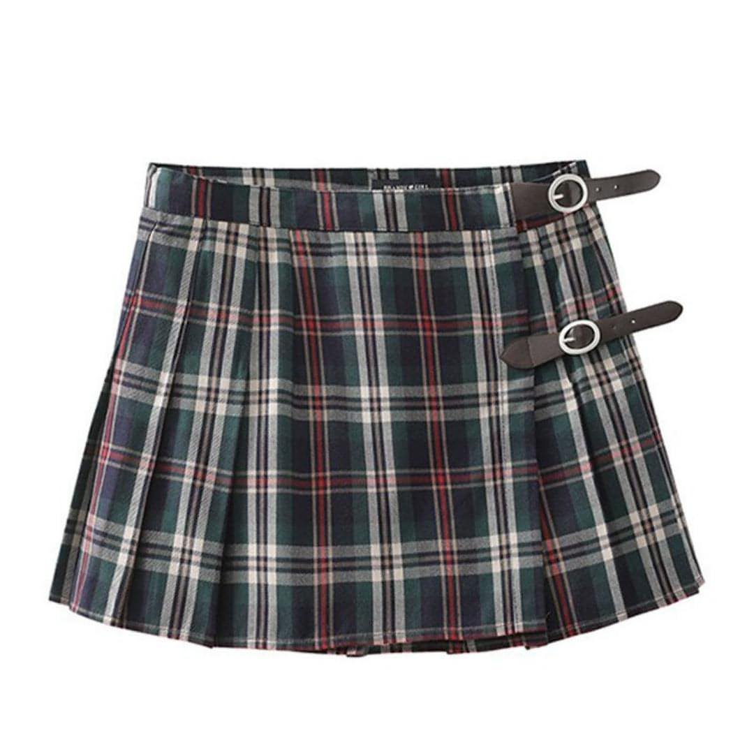 Carmine Juneberry pleated skirt in soft fabric with a flowing, structured design, shown in a stylish, full-length view.