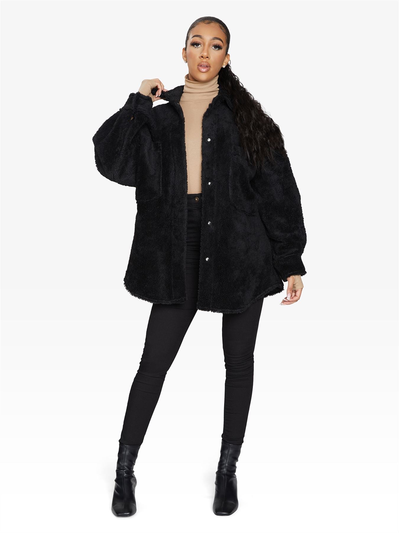 Rose Eleusis oversized patch pocket borg teddy shacket showing cozy fleece exterior and large front pockets.