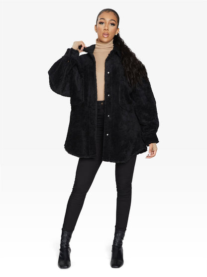 Rose Eleusis oversized patch pocket borg teddy shacket showing cozy fleece exterior and large front pockets.