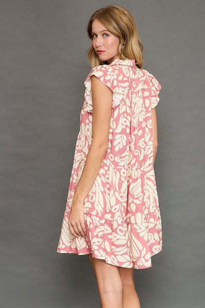 Two-tone printed ruffled cap sleeve mini dress by Jade Icarus, featuring a stylish full-size design and playful pattern.