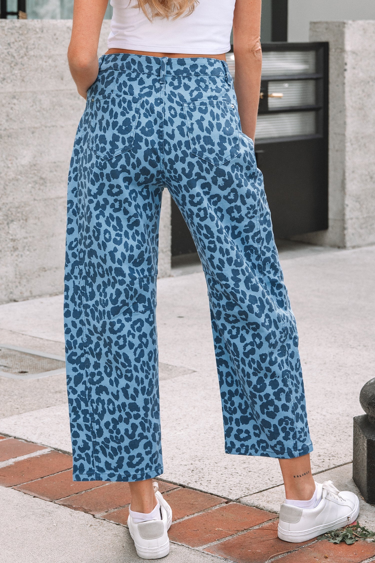 Byzantium Bay leopard high waist straight jeans for women, showcasing stylish animal print denim with a high-rise fit.