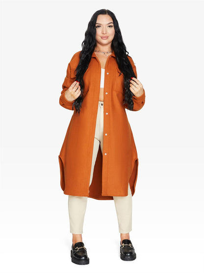 Rose Eleusis oversized longline shacket with a relaxed fit, featuring a button-up front and soft fabric in a neutral tone.