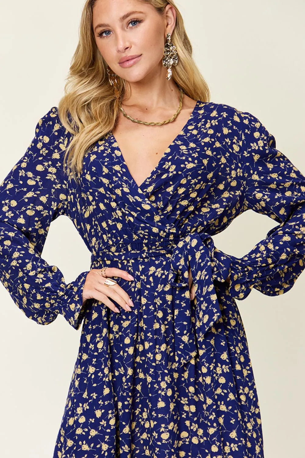 Pear Daisy double take full size tie-back flounce sleeve dress, featuring a stylish design with flounced sleeves and a tie-back detail.