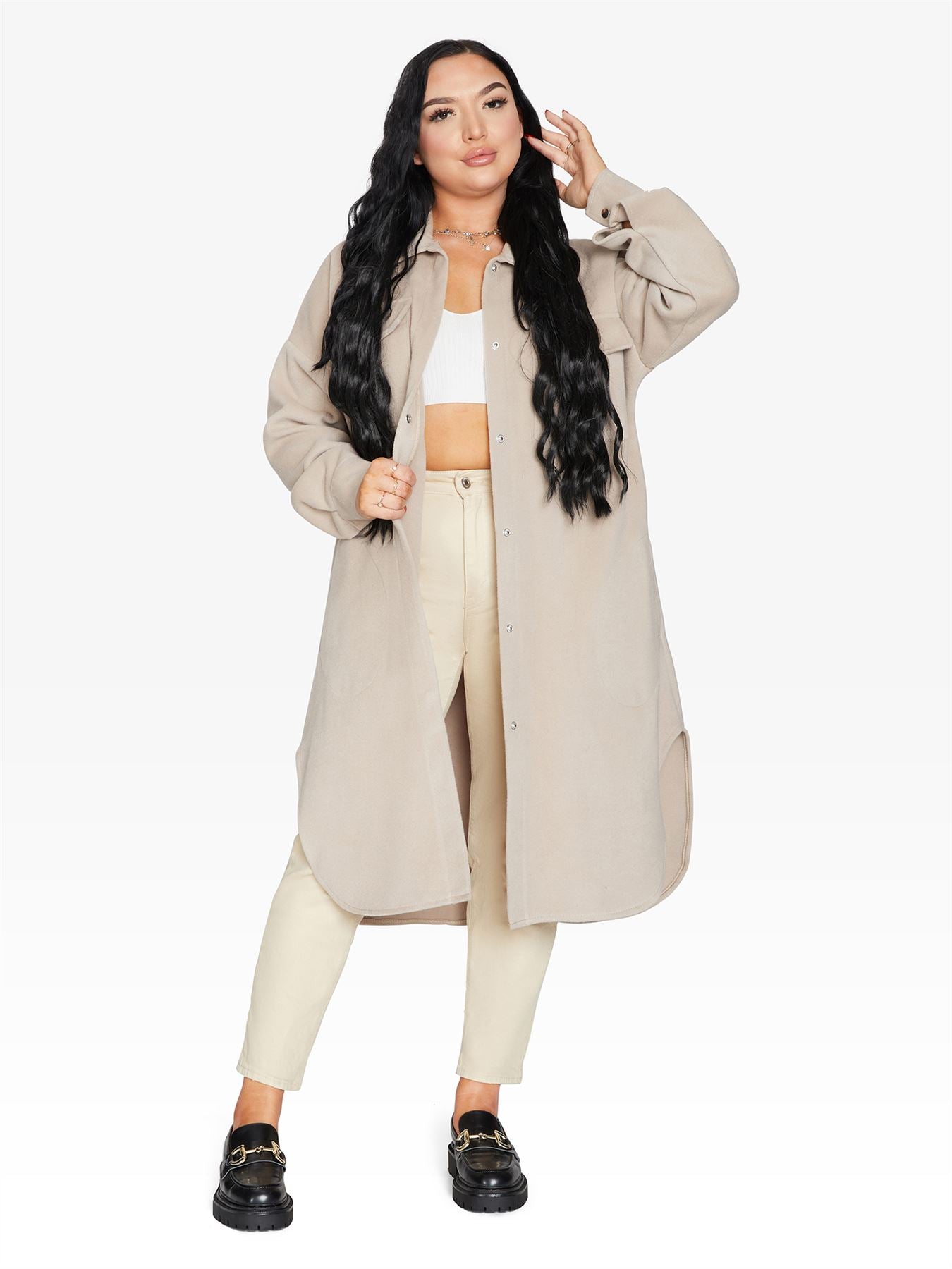 Rose Eleusis oversized longline shacket in neutral tones, showcasing its relaxed fit and oversized collar, perfect for casual layering.
