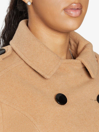 Rose Eleusis A-Line double-breasted coat, stylish jacket with button details, shown hanging on a mannequin.