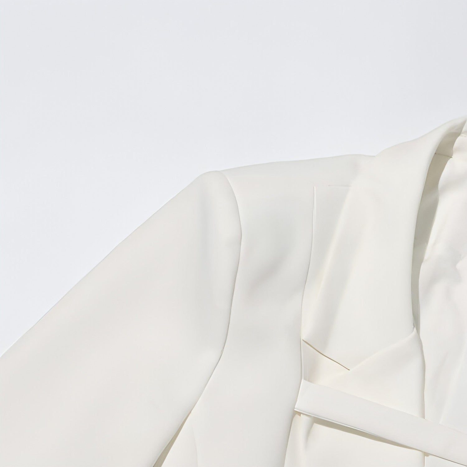 Slim fit patchwork suit jacket for women by Carmine Juneberry, featuring stylish design and tailored fit, shown on a model.