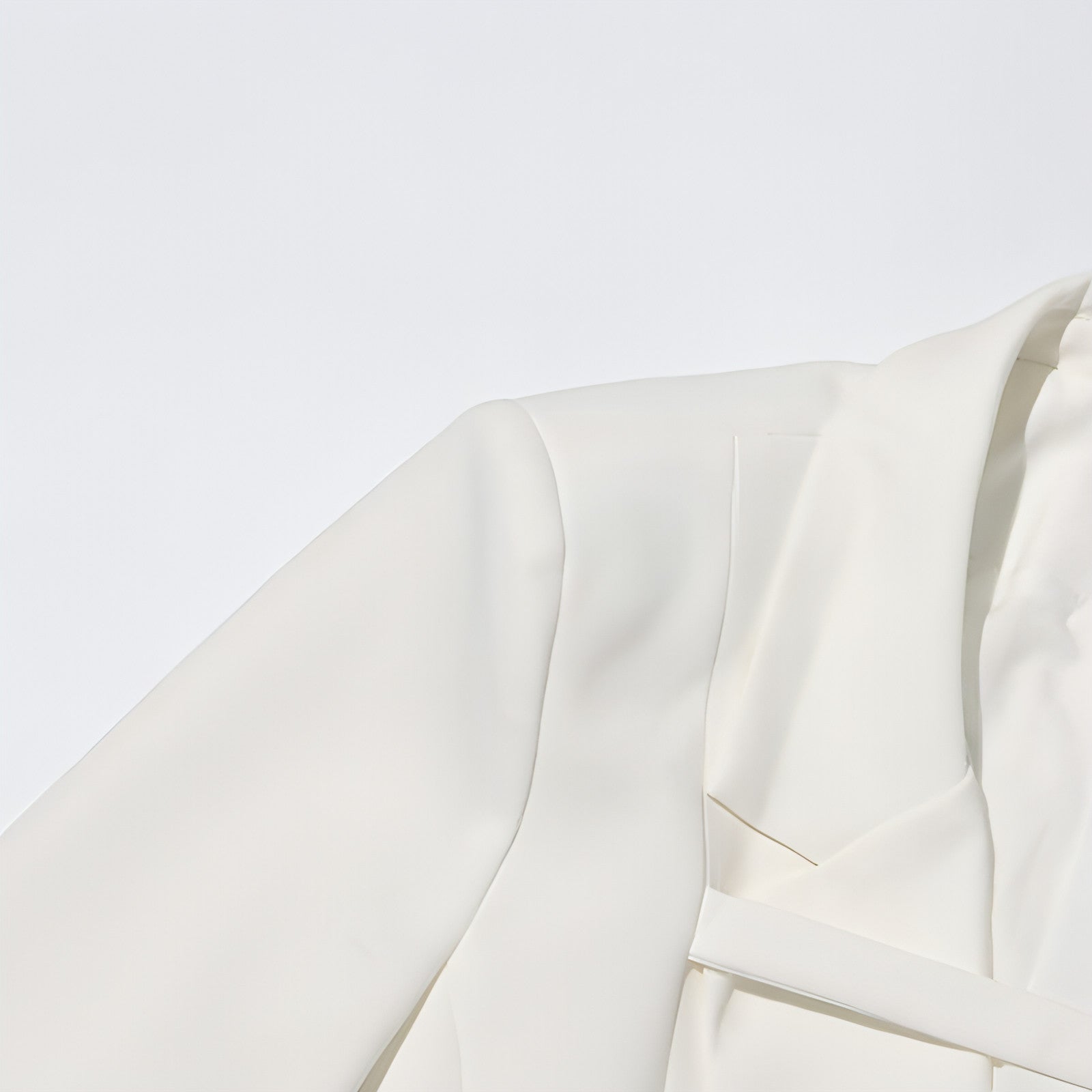 Slim fit patchwork suit jacket for women by Carmine Juneberry, featuring stylish design and tailored fit, shown on a model.