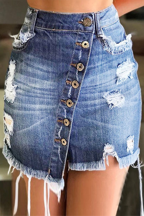 Light blue distressed denim A-line short skirt with ripped details and button front, designed for women by Lavender Pallas.