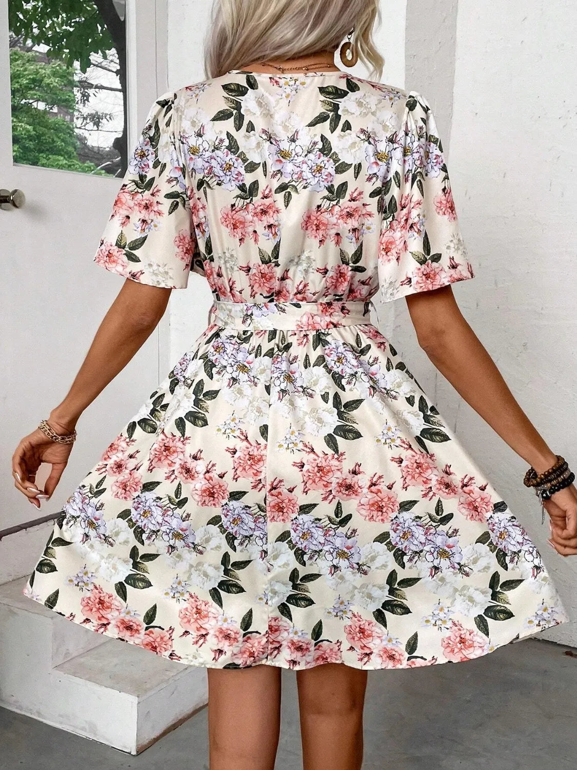 Printed surplice short sleeve mini dress from Ruby Styx, featuring a flattering fit and stylish design for women&