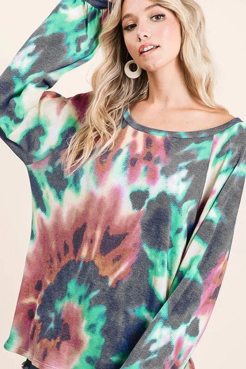 Carmine Juneberry BiBi tie-dye print terry top with puff sleeves, showcasing colorful fabric and stylish casual design.