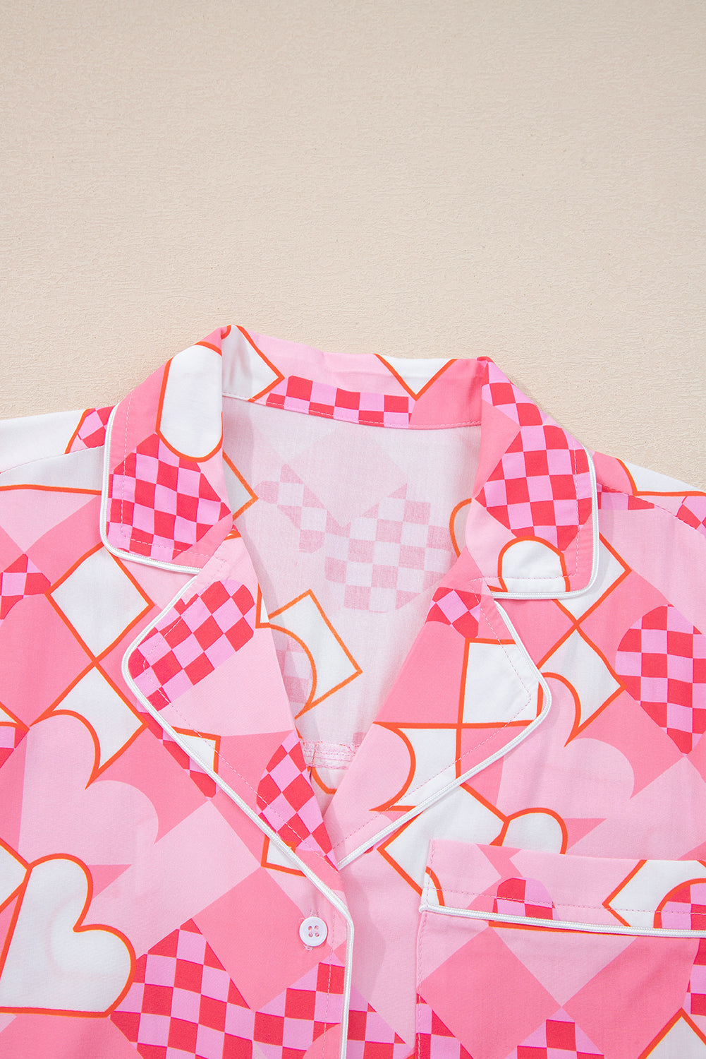 Byzantium Bay Valentine heart pajama set featuring a matching shirt and shorts with romantic heart designs.