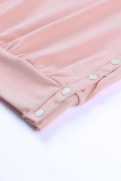 Pink crew neck slit buttons sweatshirt by Harlequin Daisy, featuring a casual fit and stylish slit button details.