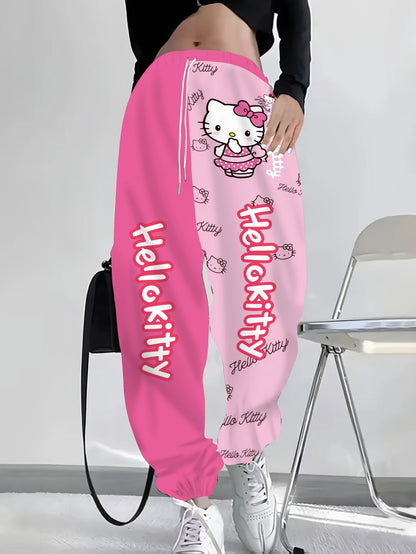 Hot pink and light pink split-color Hello Kitty long pants with cartoon polka-dot bow print, stylish ladies&